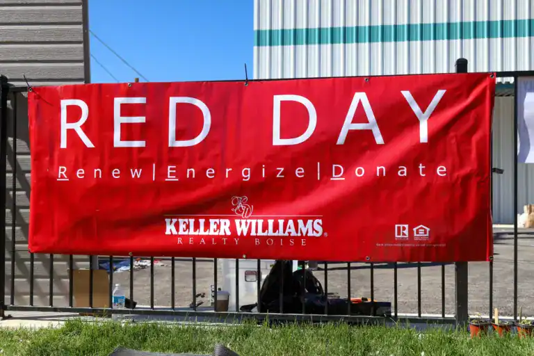 Red Day community event banner promoting renewal, energizing, and donation initiatives by Keller Wil.