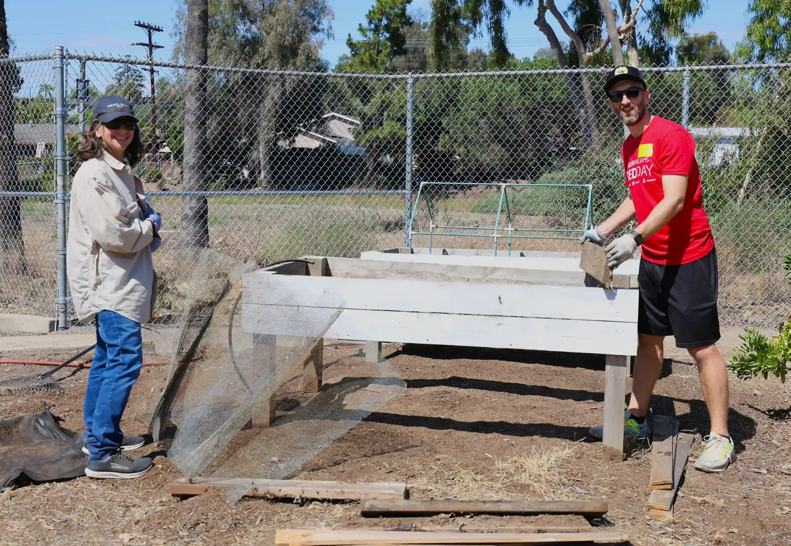Keller Williams RED Day 2026 volunteers working at San Diego school garden