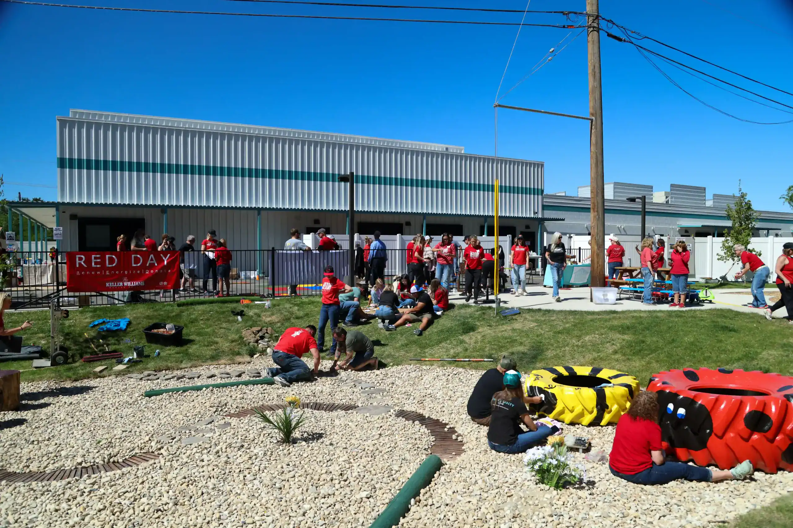 Legacy Realty Network family volunteering during RED Day 2026 in Boise