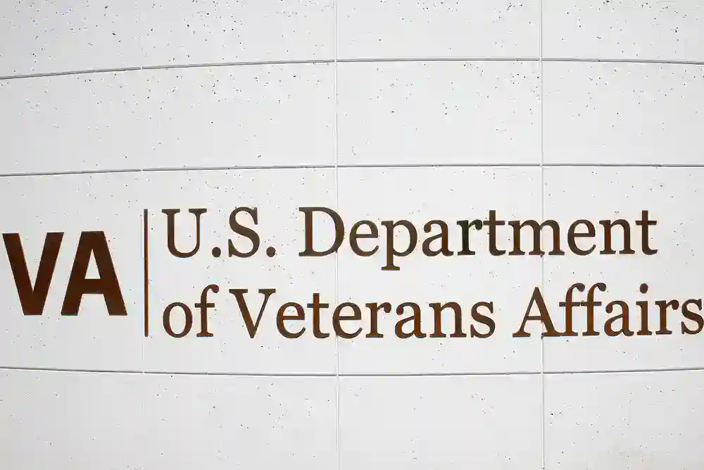 U.S. Department of Veterans Affairs sign on a wall.